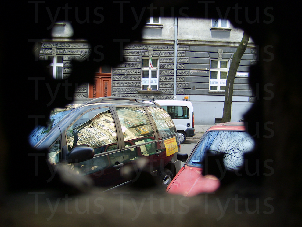 Through the rusty judas-hole