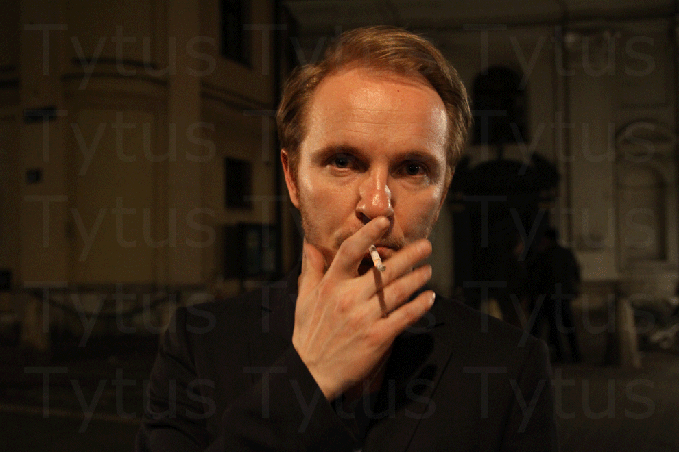 Jacek Borcuch smoking a cigarette